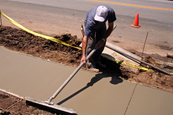 Sidewalk Building in Laurel